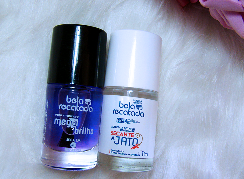 Dois frascos de esmalte de unhas, um em tom intenso e outro com brilho, apresentados em um fundo simples e elegante.